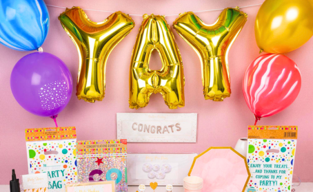 Birthday party decorations with colourful balloons and banners