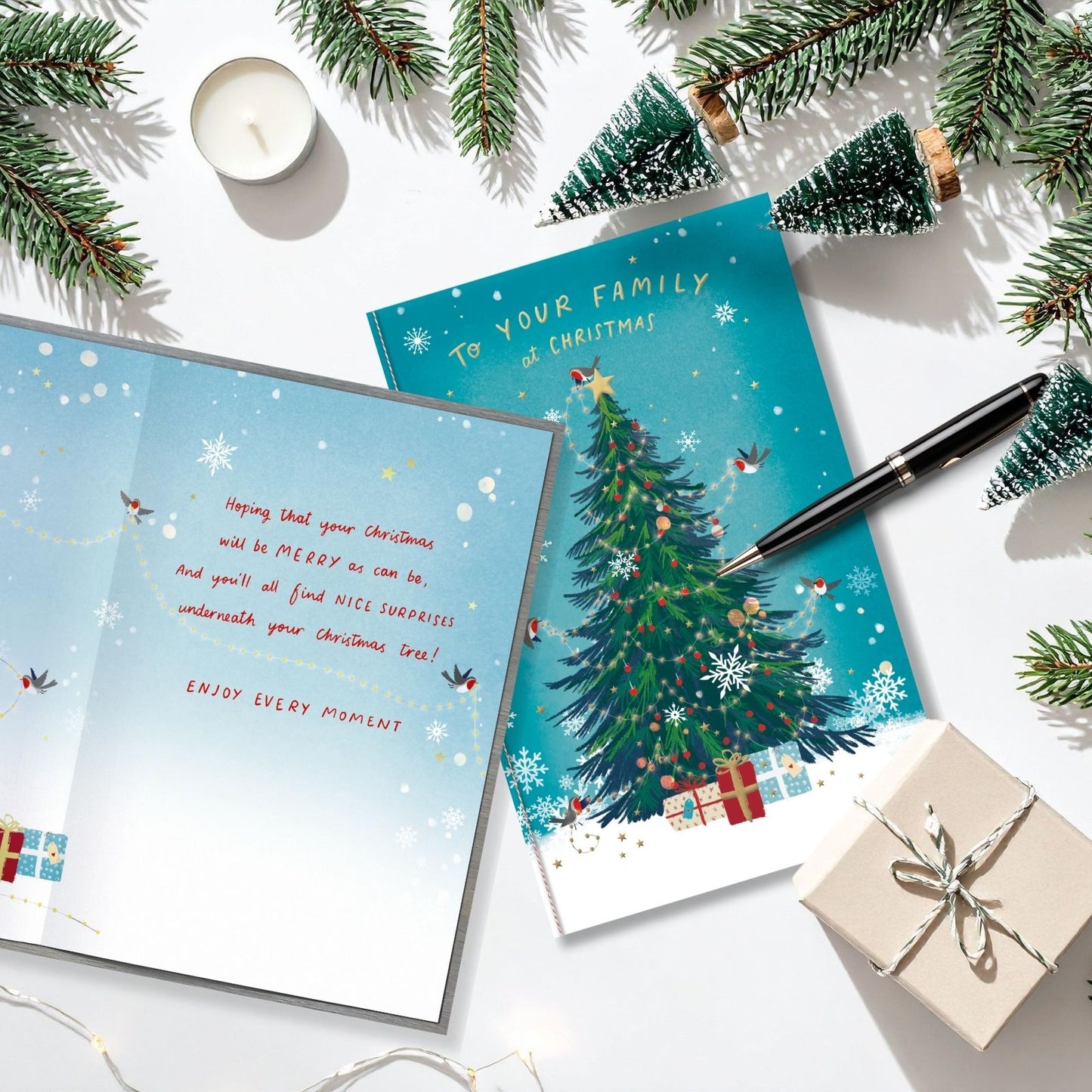 To Your Family Christmas Card Artistic Robins Decorating The Tree Xmas Greetings