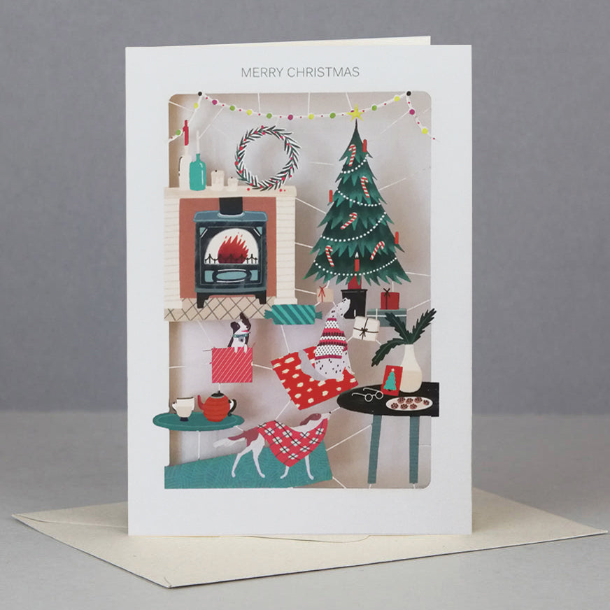 Paper Cut Fireside With The Dogs Christmas Greeting Card