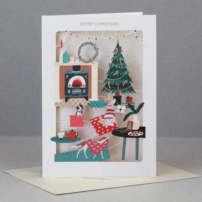 Paper Cut Fireside With The Dogs Christmas Greeting Card