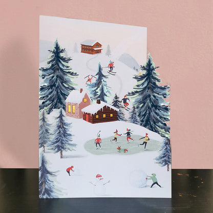 Paper Cut Art Skiing & Ice Skating Scene Christmas Greeting Card